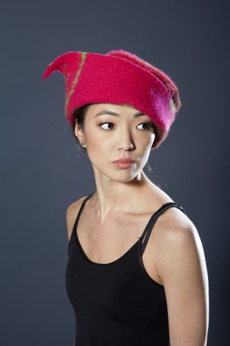 Magenta hat with green marks, 2015